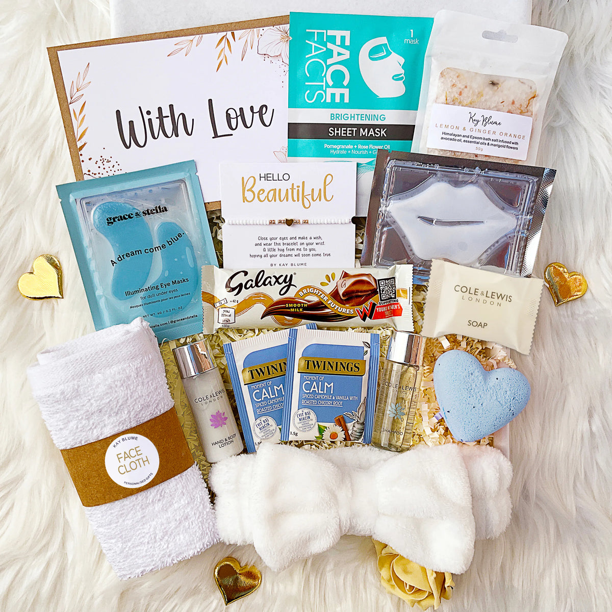 Luxury gift box with spa essentials, sheet masks, soap, and calming tea for self-care and pampering.
