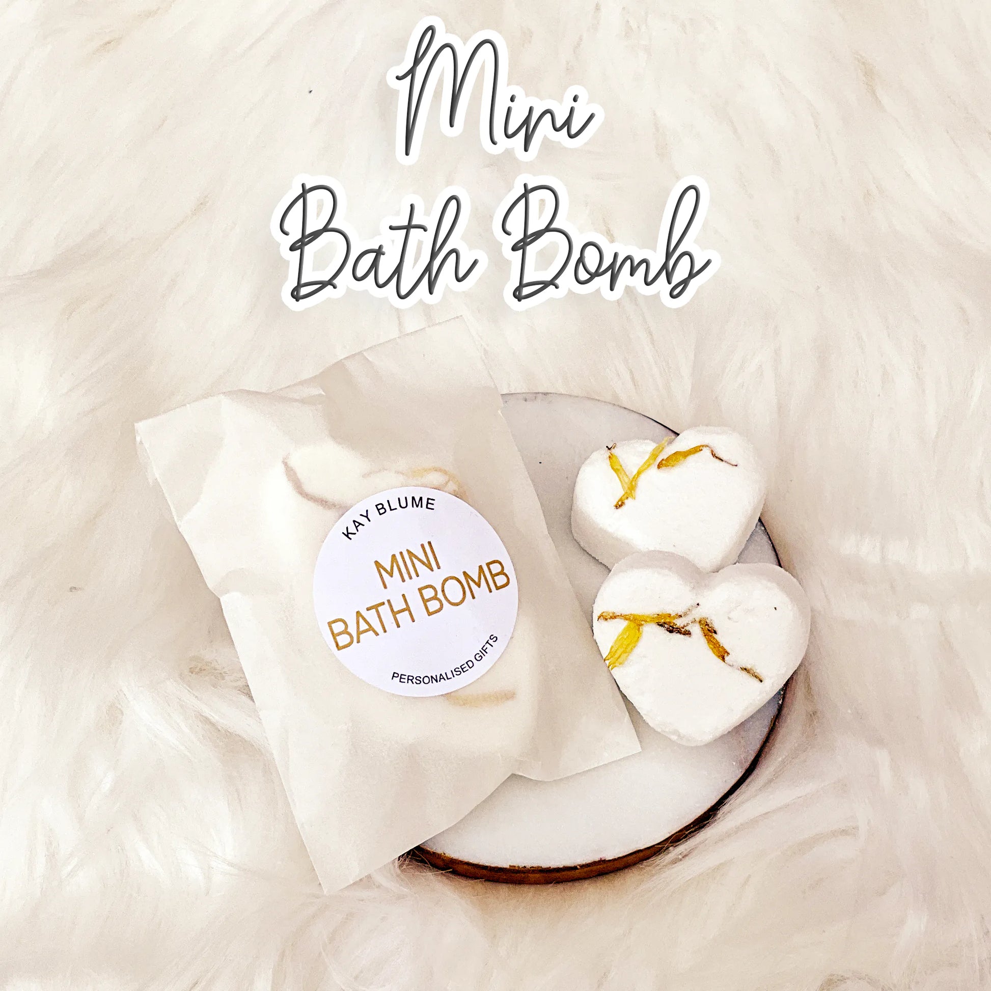 Mini Bath Bombs from KAY BLUME on a soft background, perfect for self-care and relaxation.